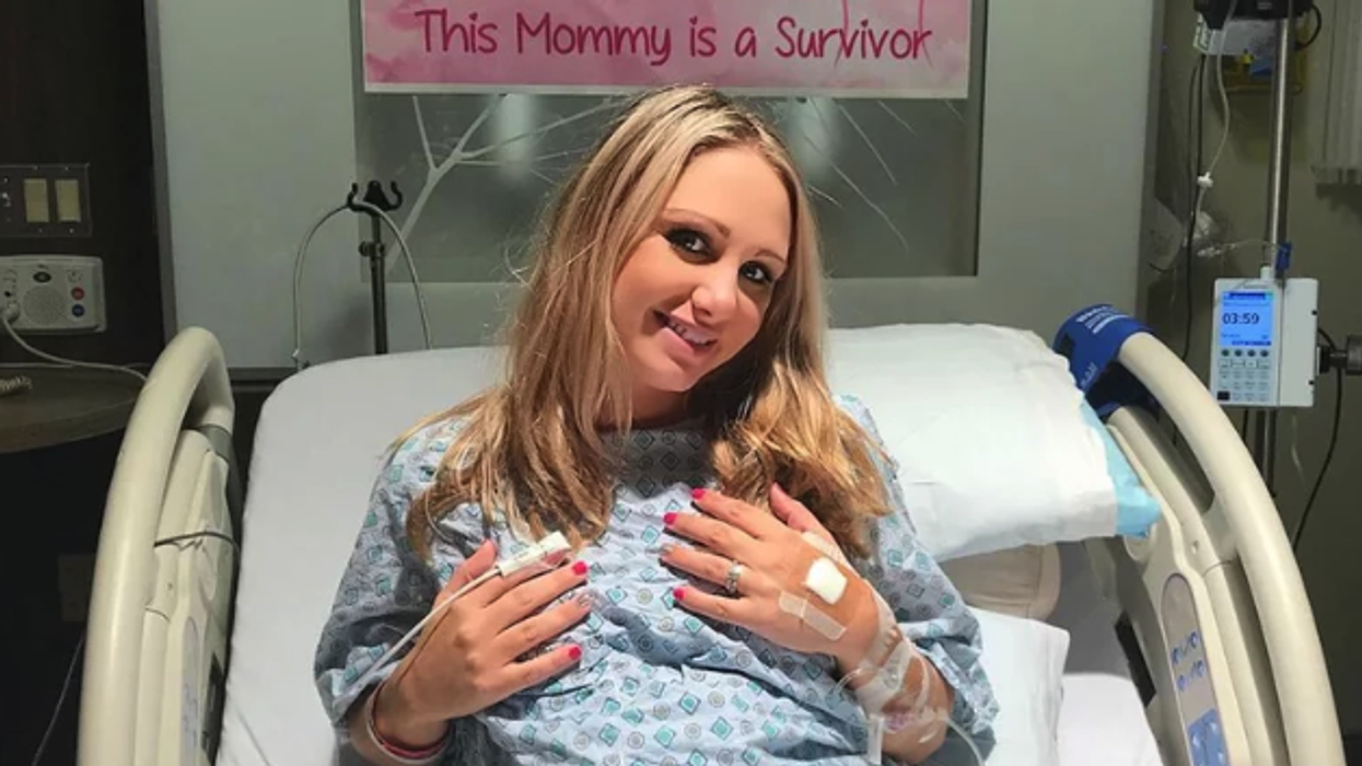 The Inspiring Reason This Breast Cancer Survivor Posted a 'No Breastfeeding Zone' Sign Will Leave You Speechless