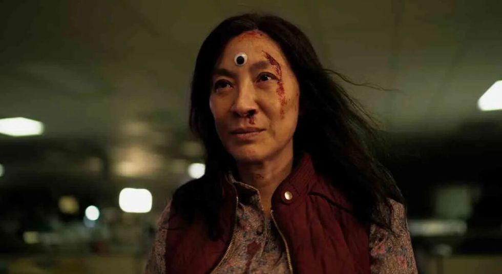 Michelle Yeoh in Everything Everywhere All At Once with a googly eye on her forehead.</p><p>