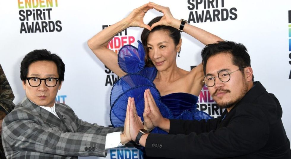 Michelle Yeoh with cast from Everything Everywhere All At Once