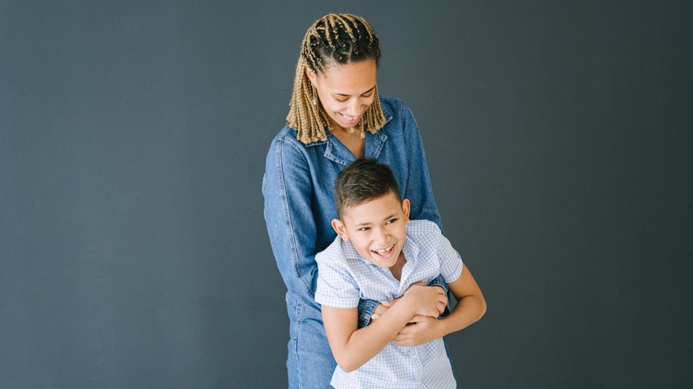 mother hugging her son