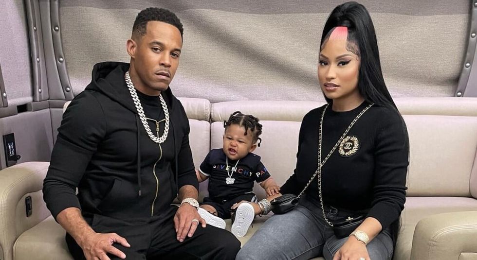 Nicki Minaj with son papa bear wearing all black.