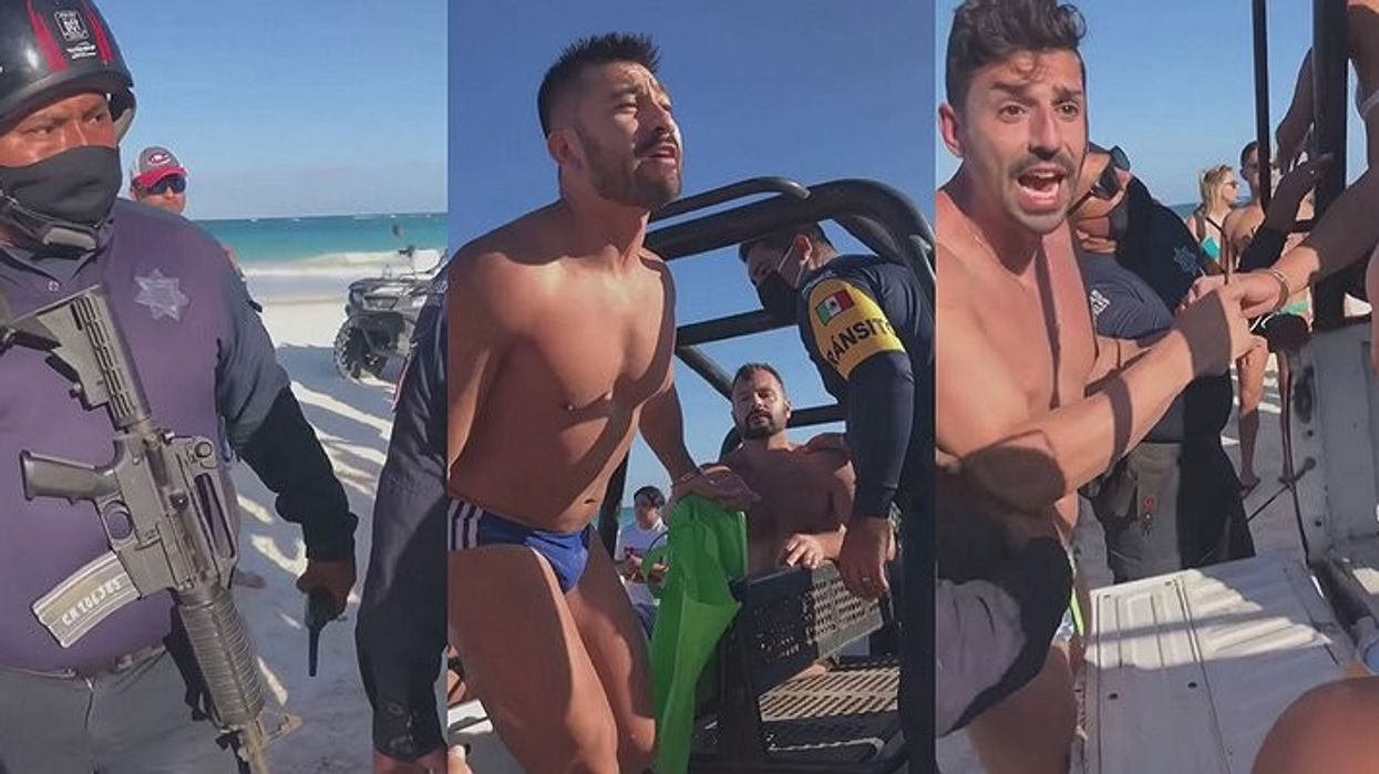 Gay Couple Handcuffed For Kissing On The Beach, Outraged Crowd Halts Arrest