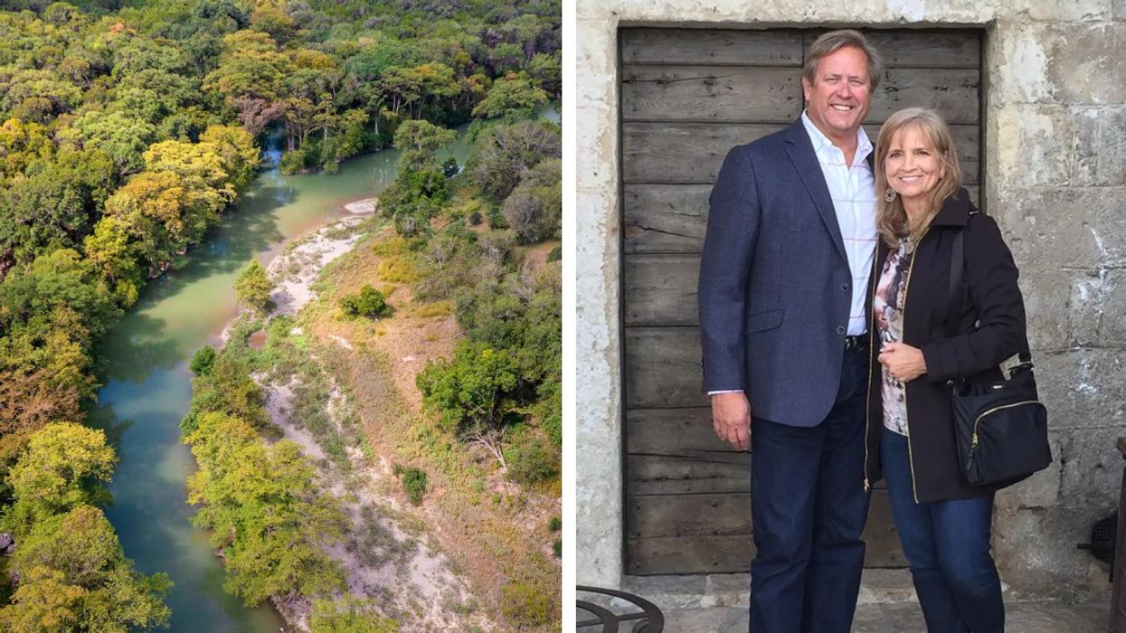 Overhead view of trees and water and a man and woman pose for the camera.