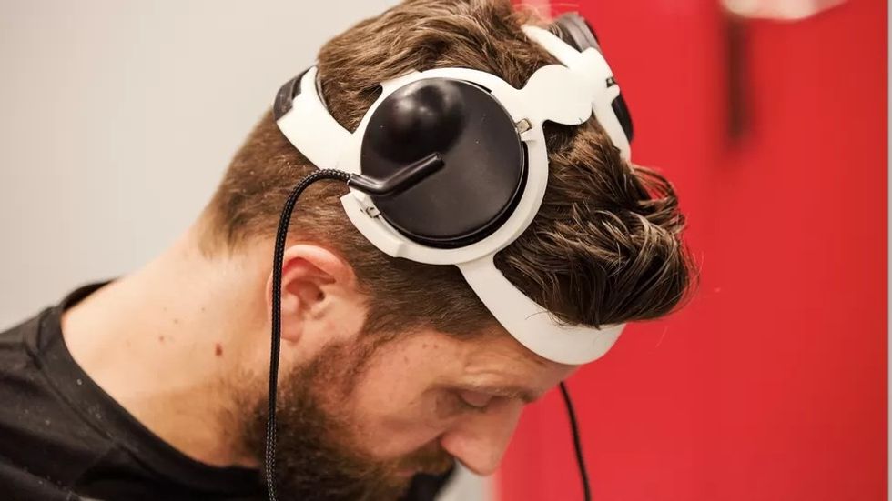 paralyzed man walk again AI technology