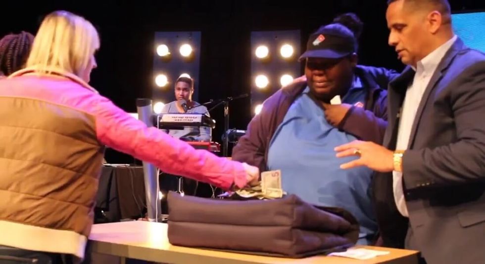 Pastor surprises pizza delivery woman with huge tip.