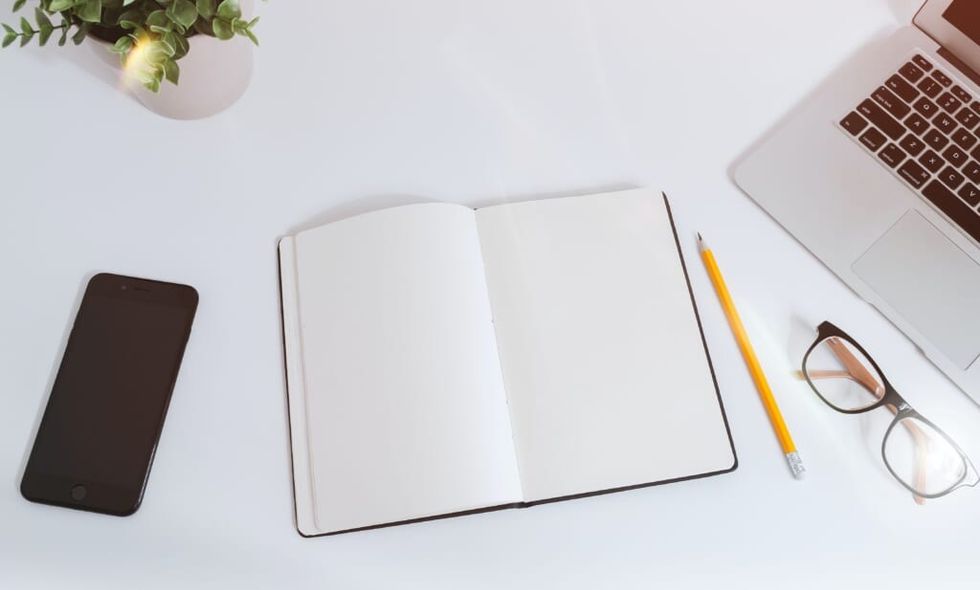 pencil paper and phone