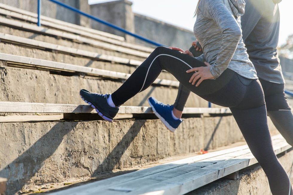 people-stretching-on-steps