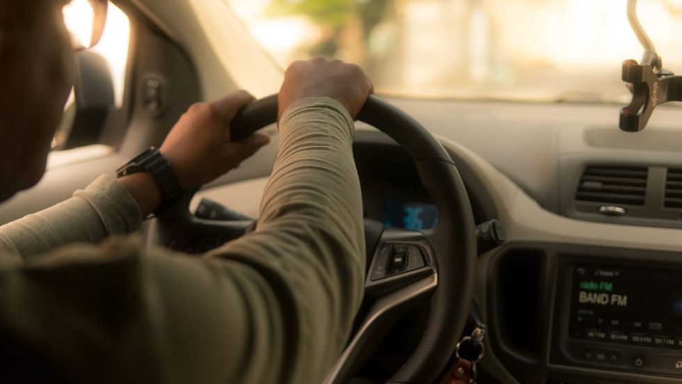 person driving a car