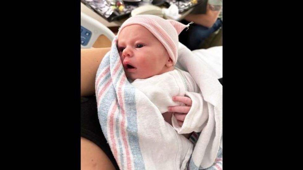 person holding a baby