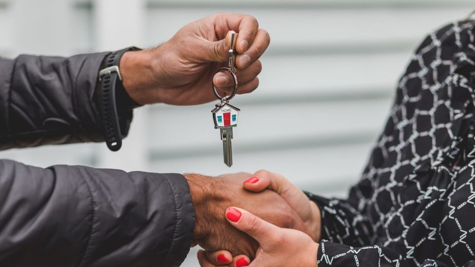 person holding a key