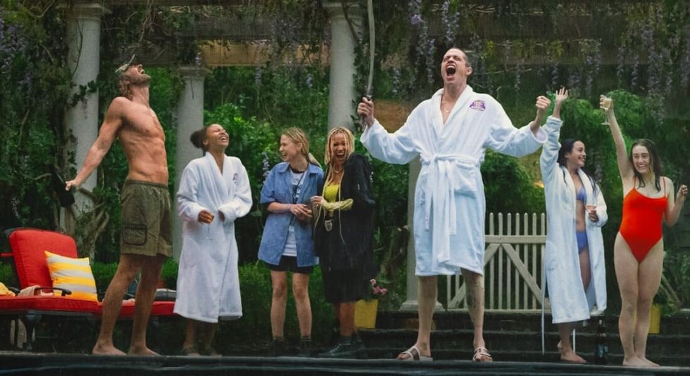 Pete Davidson wearing a white robe screaming outside in Bodies, Bodies, Bodies