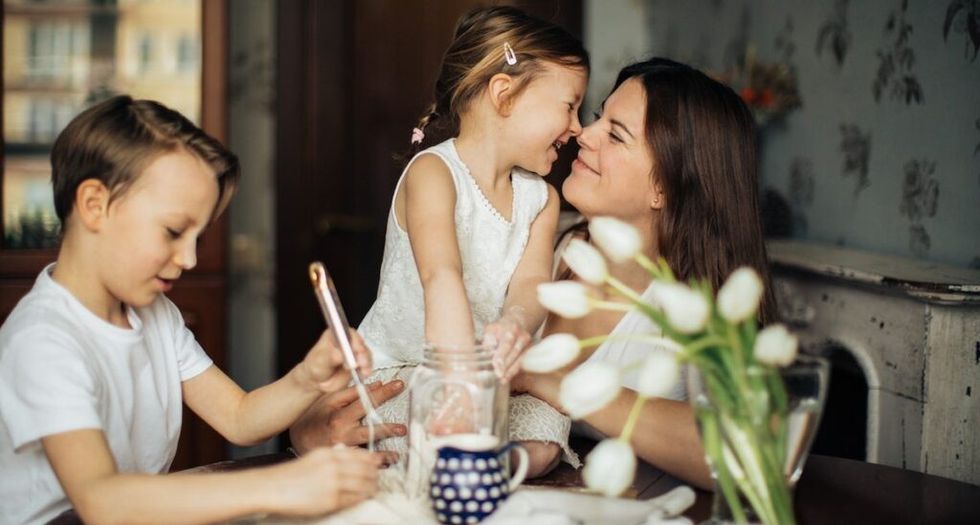 Photo of woman playing with her children 3806953 1024x549