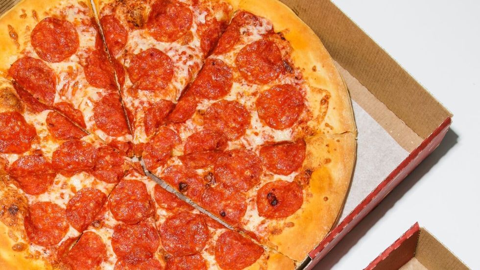 pizza in a take out box