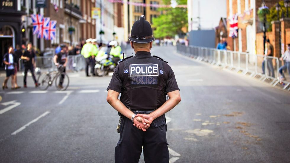 police officer standing on the street