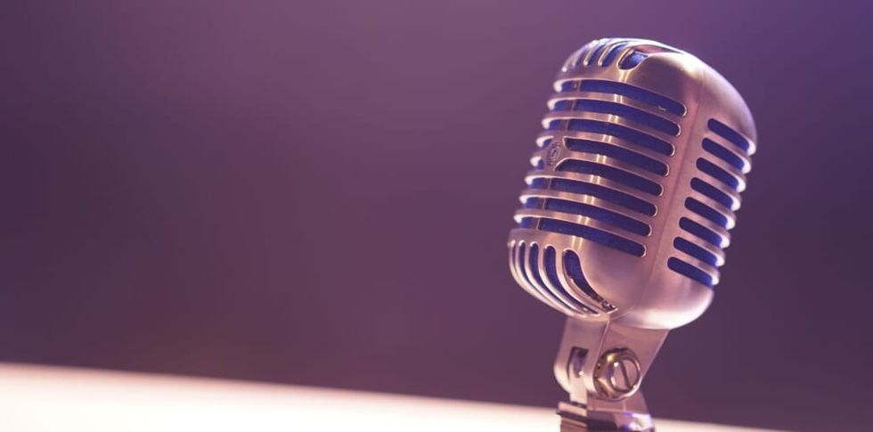 purple background condenser microphone