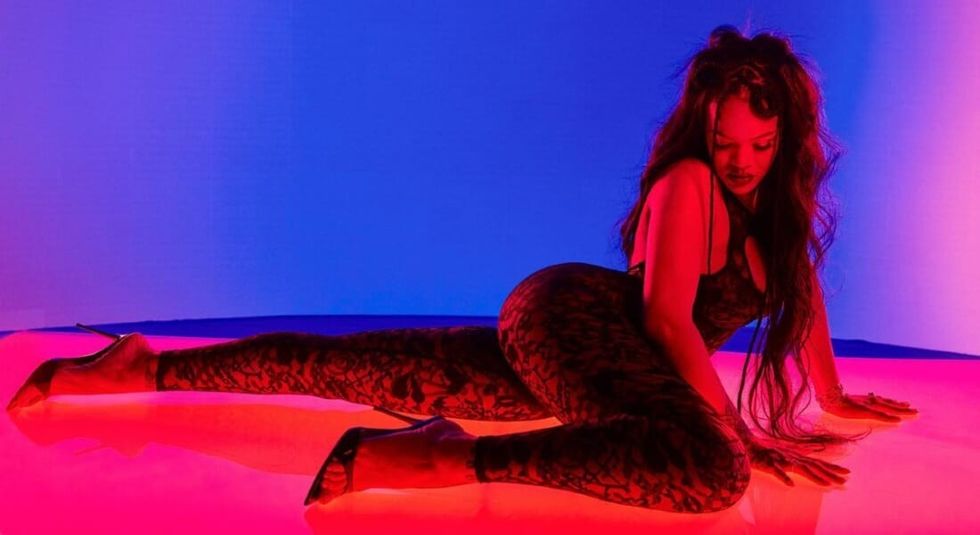 Rihanna posing in promotional shot days before the Superbowl.