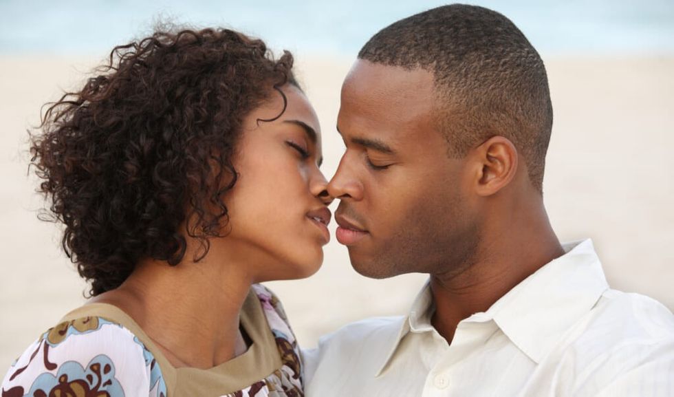 Romantic couple kiss at the beach