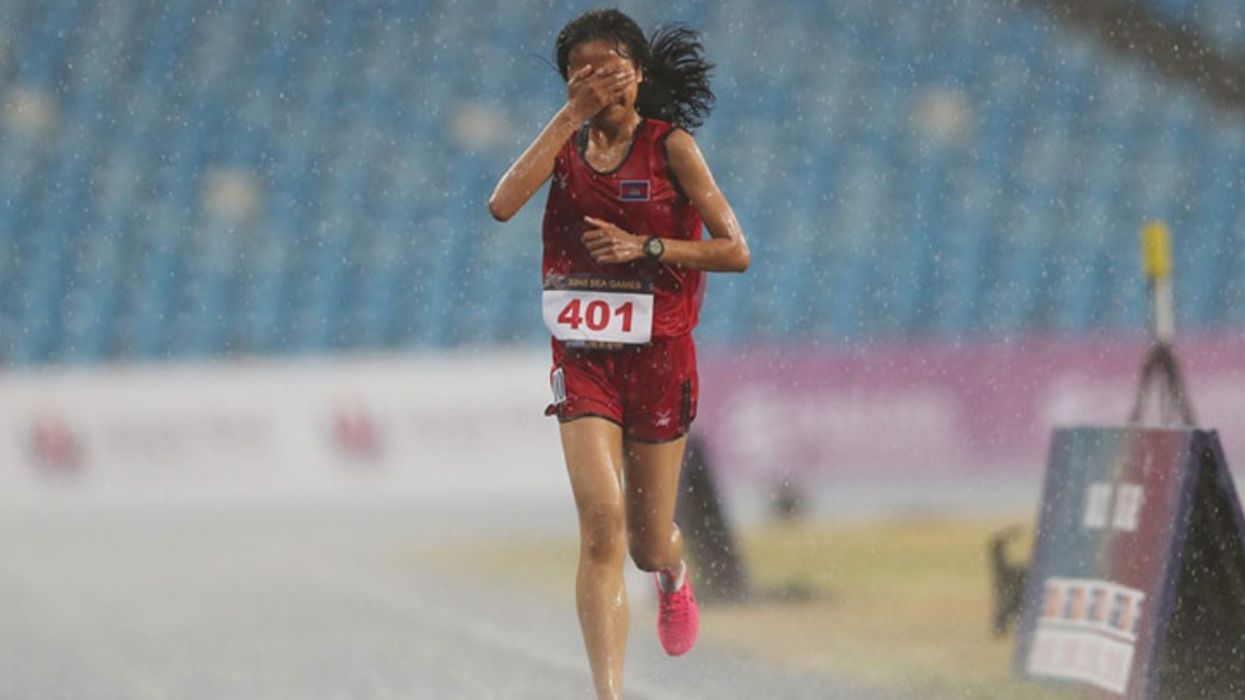 Last Place Runner Refuses to Quit Despite Torrential Rain, Wins Hearts & Inspires the World (WATCH)
