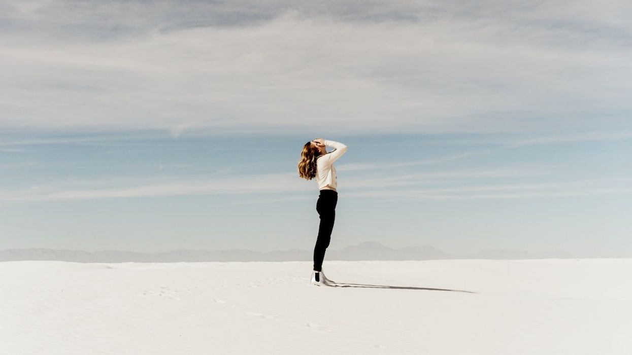 Sad woman arms on face