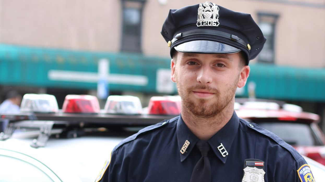 selective focus photography of policeman