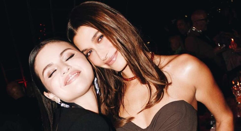 Selena Gomez and Hailey Bieber posing to the camera