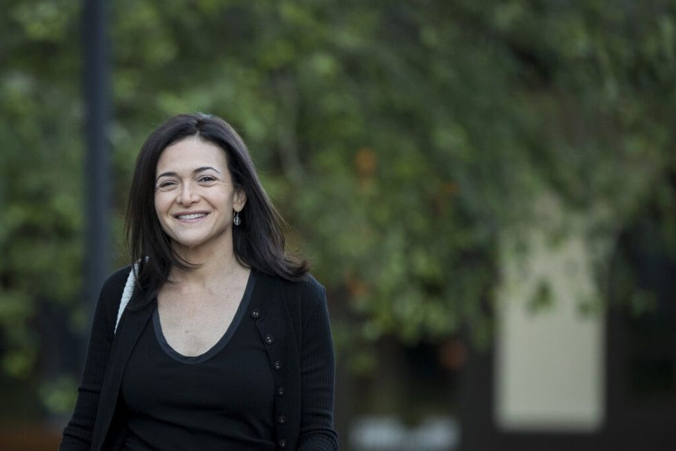 Sheryl-Sandberg-happily-walking