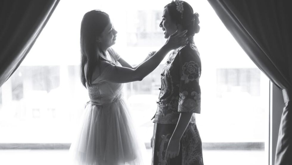 sisters on wedding day