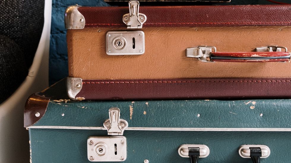 suitcases stacked on top of each other