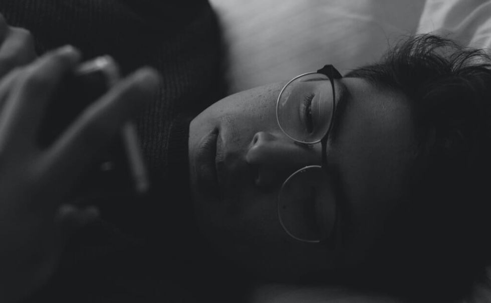 texting in bed on cell phone