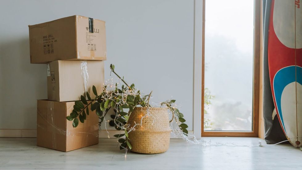 three cardboard boxes stacked on top of each other