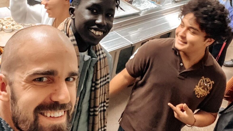 three people taking a picture