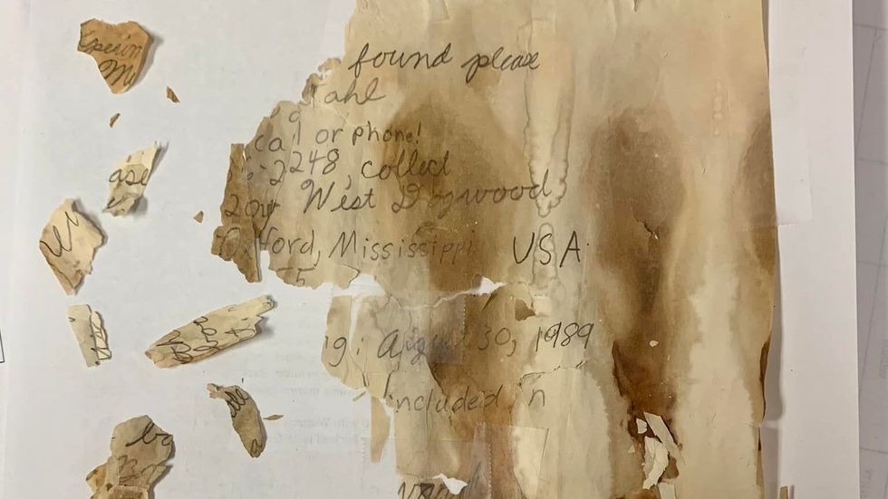 torn handwritten note