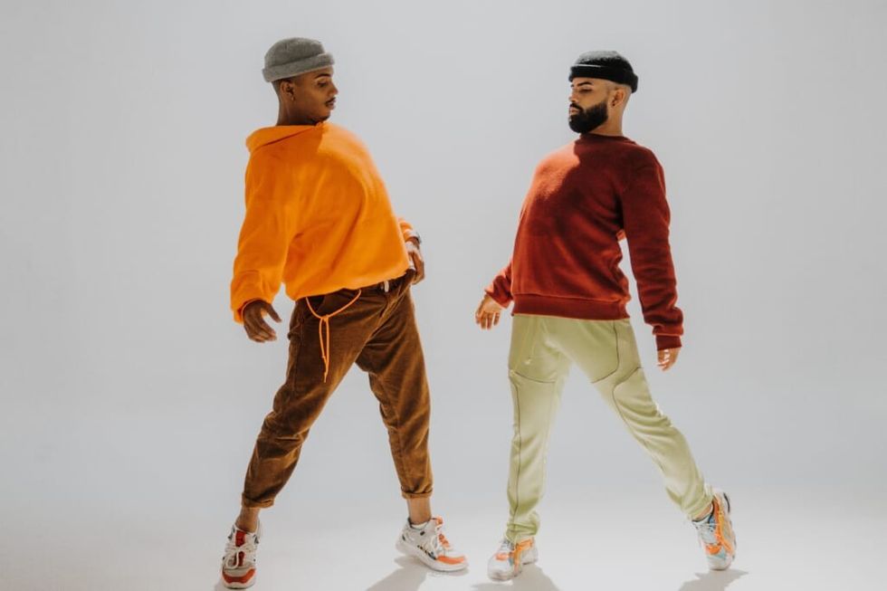 two men dance together