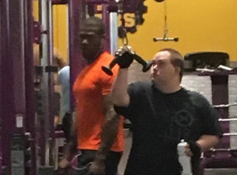 two men working out at the gym