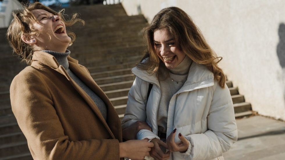two women laughing