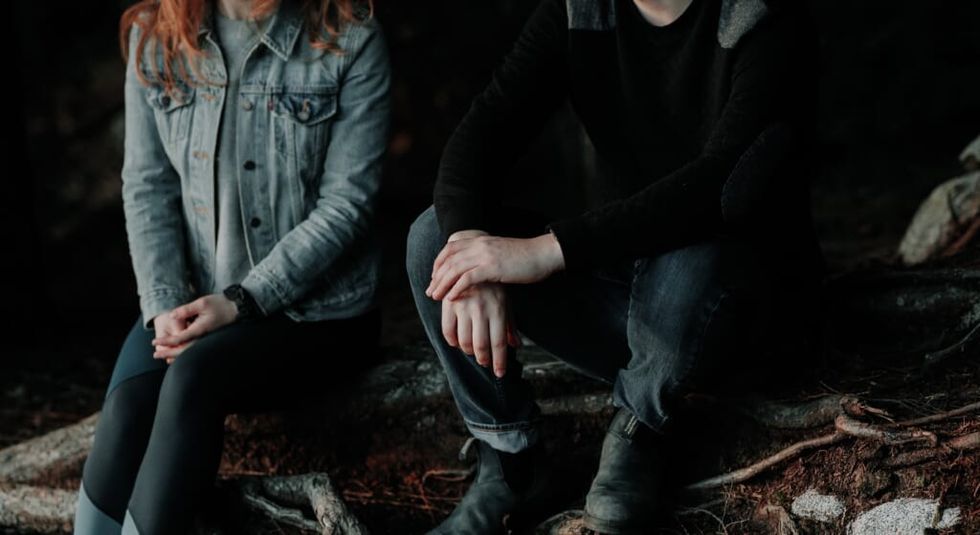 two young people having serious conversation