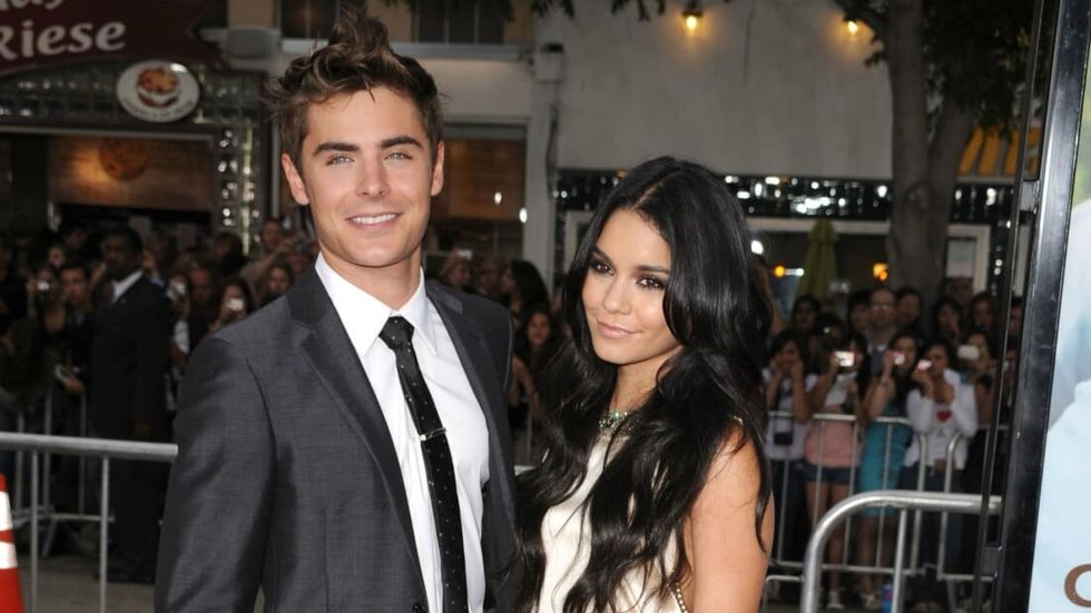 Vanessa Hudgen smiling with Zac Efron