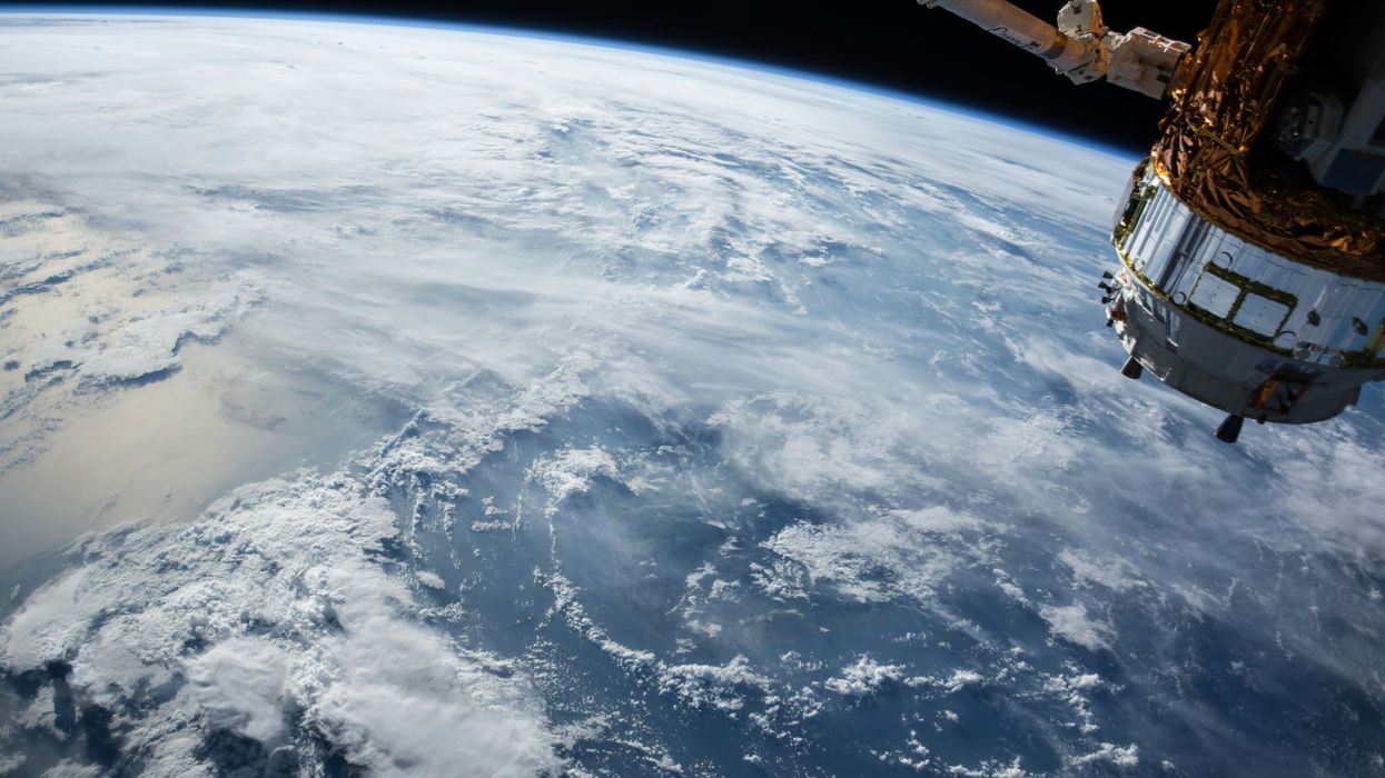 View of Earth and satellite