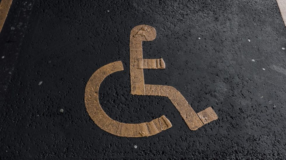 wheelchair accessible sign on door