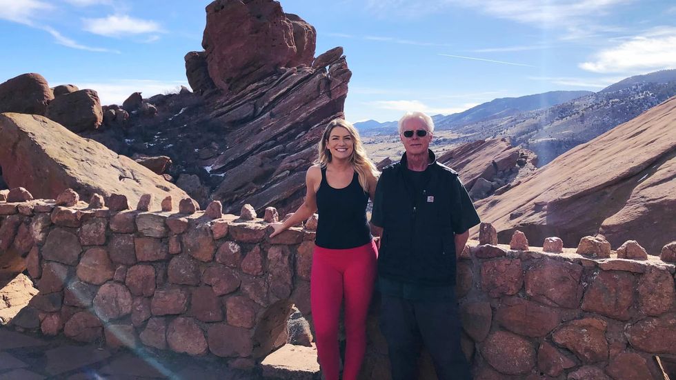 woman and an older man posing for a picture