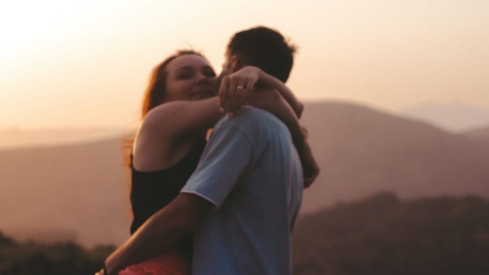 woman embracing her husband