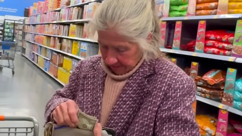 woman helps stranger in a store