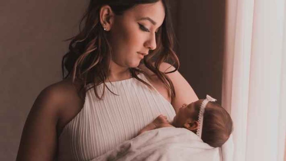 woman holding a baby