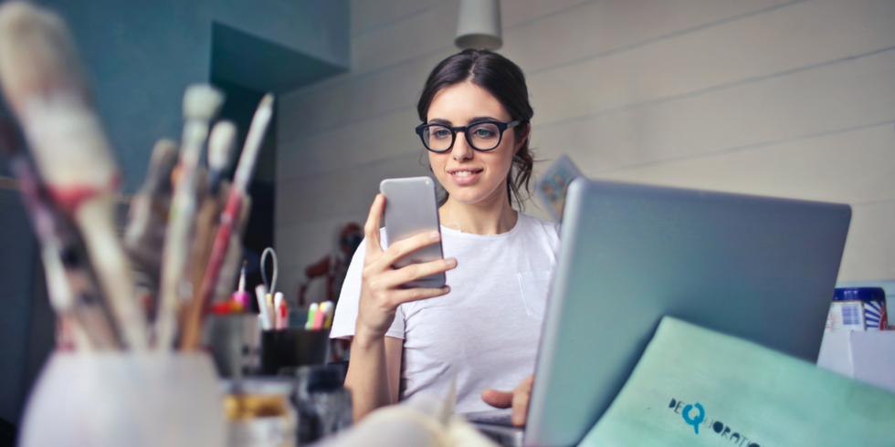 woman looking at phone
