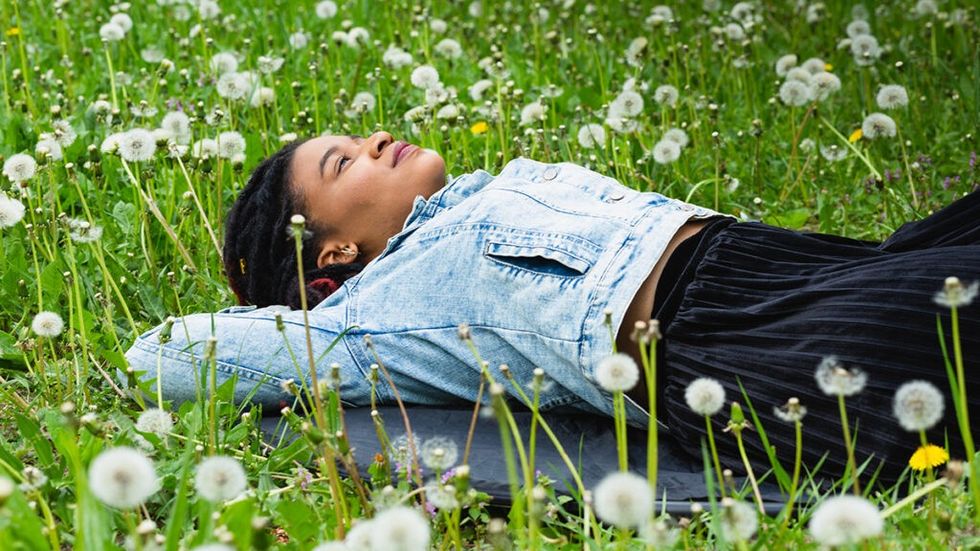 woman lying in a field