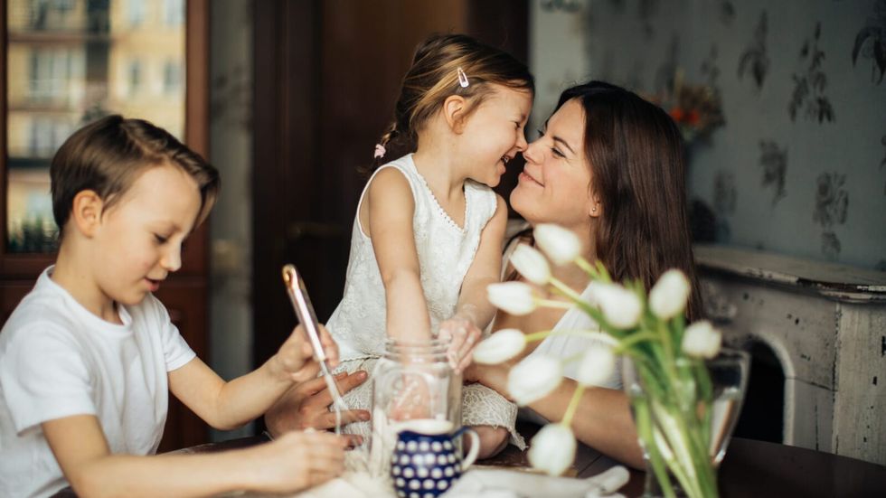 woman playing her kids
