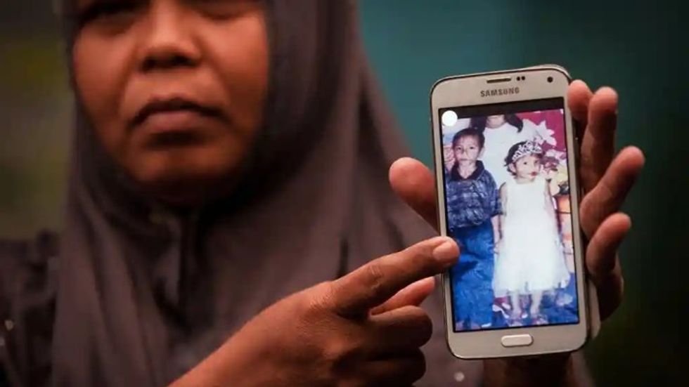 woman showing a picture on her phone