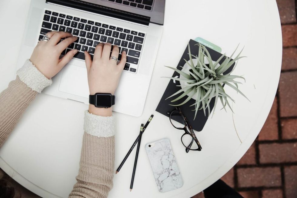 Woman-sitting-at-a-desk