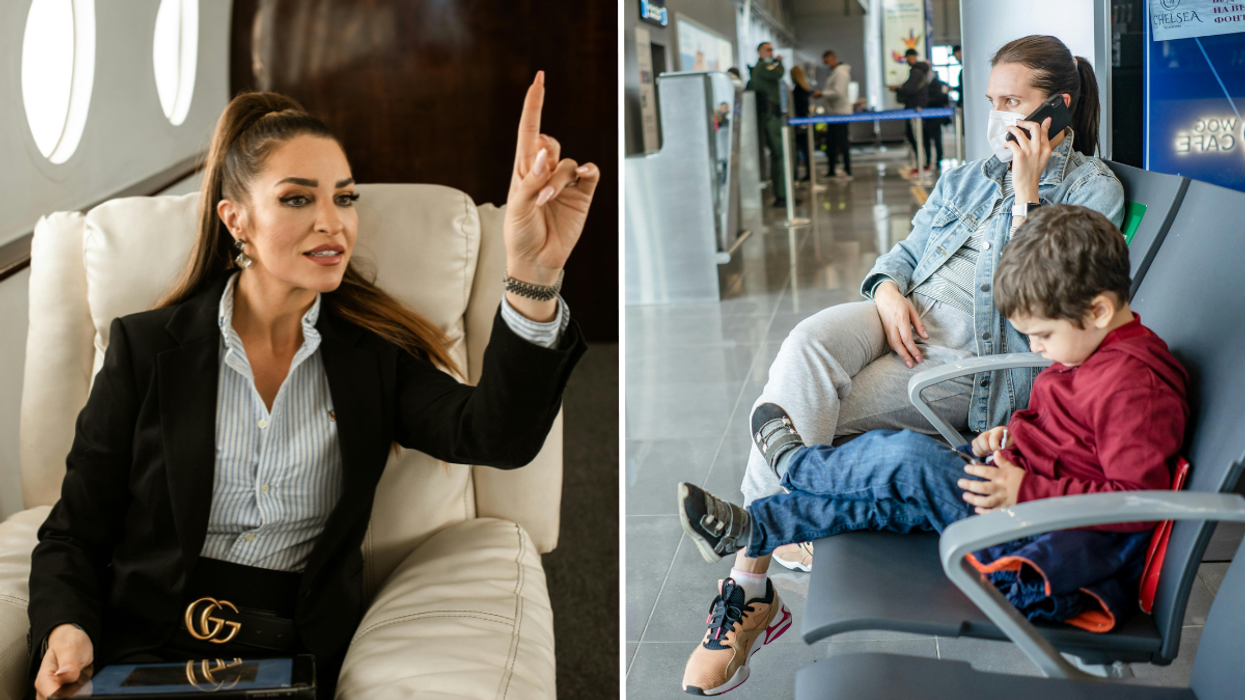 Woman sitting in a first class seat on a flight and a mother wearing a face mask with a child sitting next to her.