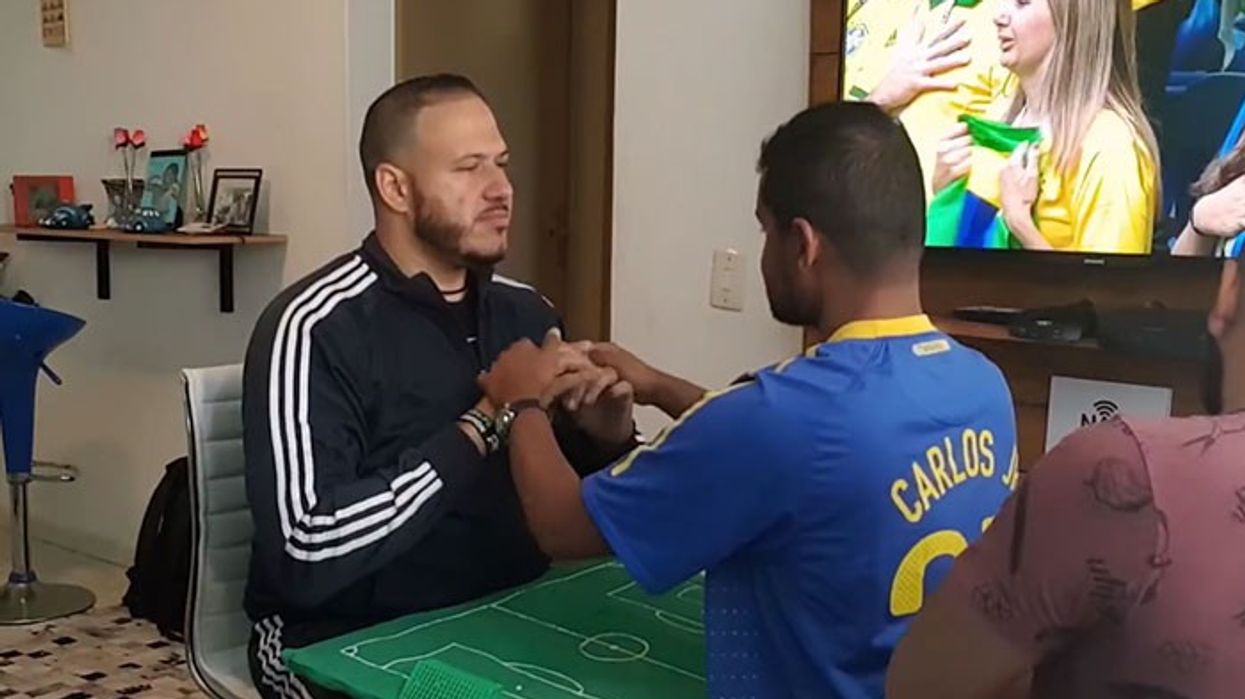 Hero of the Week: Brazilian Interpreter Goes Viral for Helping Deaf and Blind Friend Enjoy the World Cup